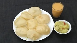 সাদা আলুর তরকারি আর লুচি